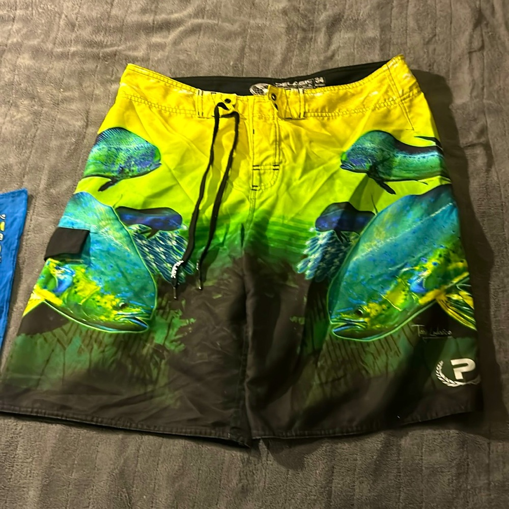 Pelagic board shorts/ bathing suit.